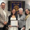 North Shore Rotary Club Grants $10K community service scholarship to Susan Wagner student Evangeline Carolan (center) flanked by Dennis Surmanek, Club President, Gale Strassberg, North Shore Rotary Scholarship Committee Chair, and Suzanne Demetrio, Club Past President during the scholarship presentation.